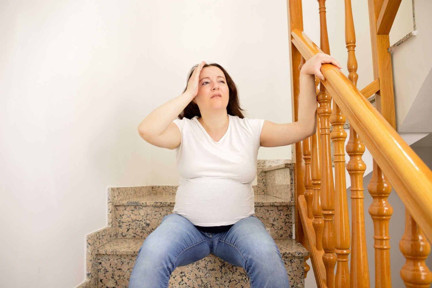 pregnant woman being clumsy 