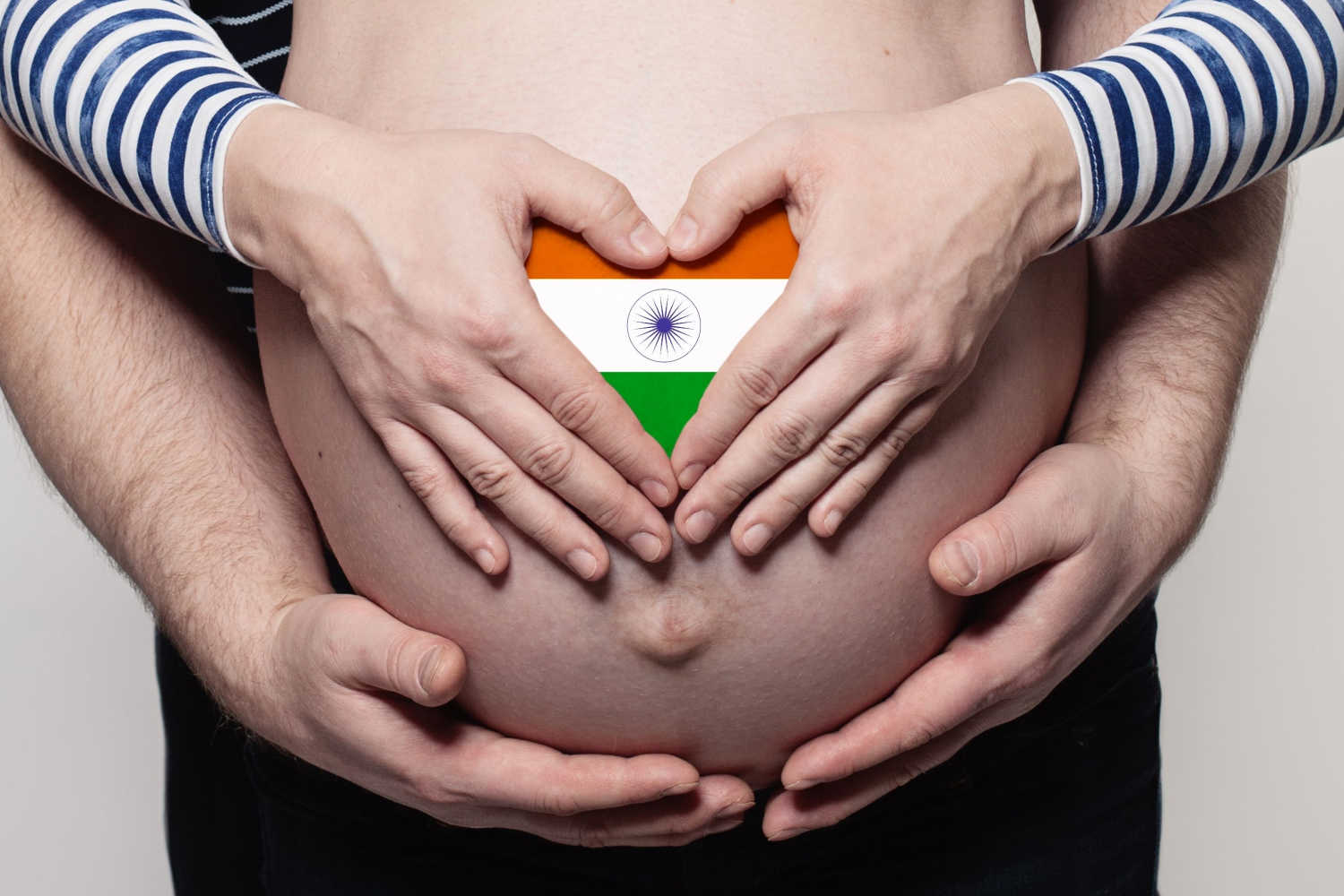 Couple showing baby bump