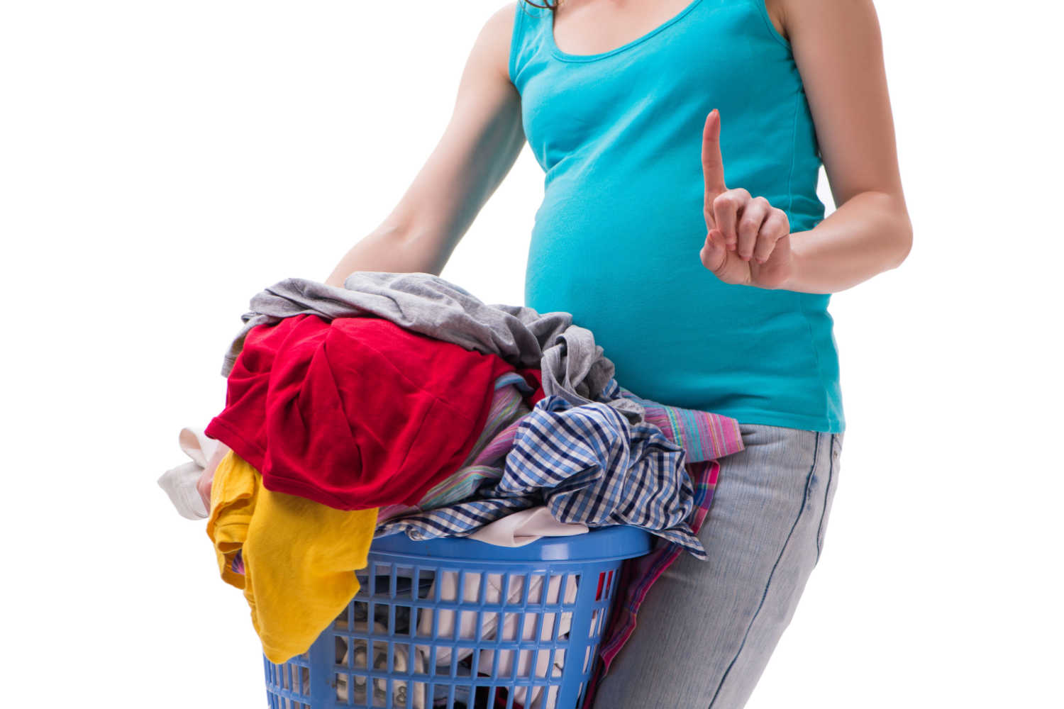 pregnant woman lifting laundry basket