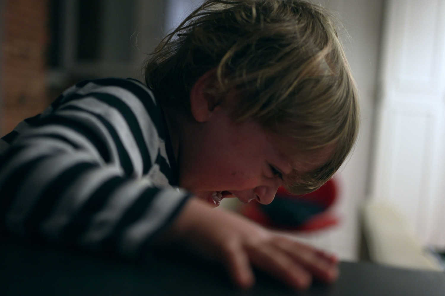 When is toddler hitting themselves a concern