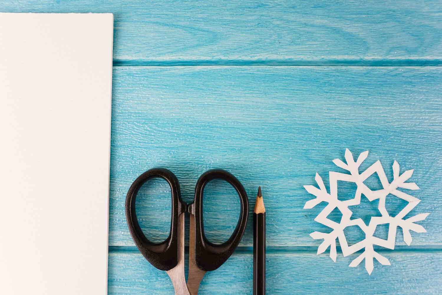 Snowflake Ripped Paper Craft activities for toddler - Being The Parent