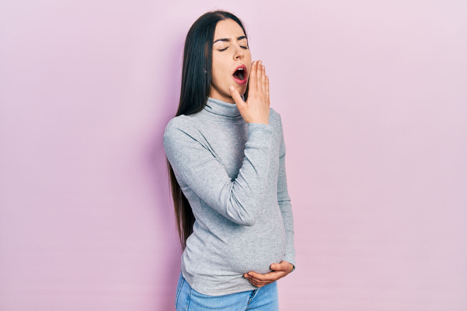 pregnant woman yawning