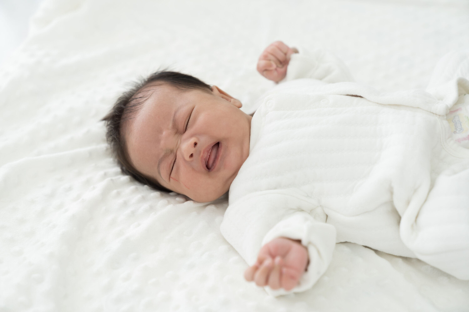 Baby lying down with seizure