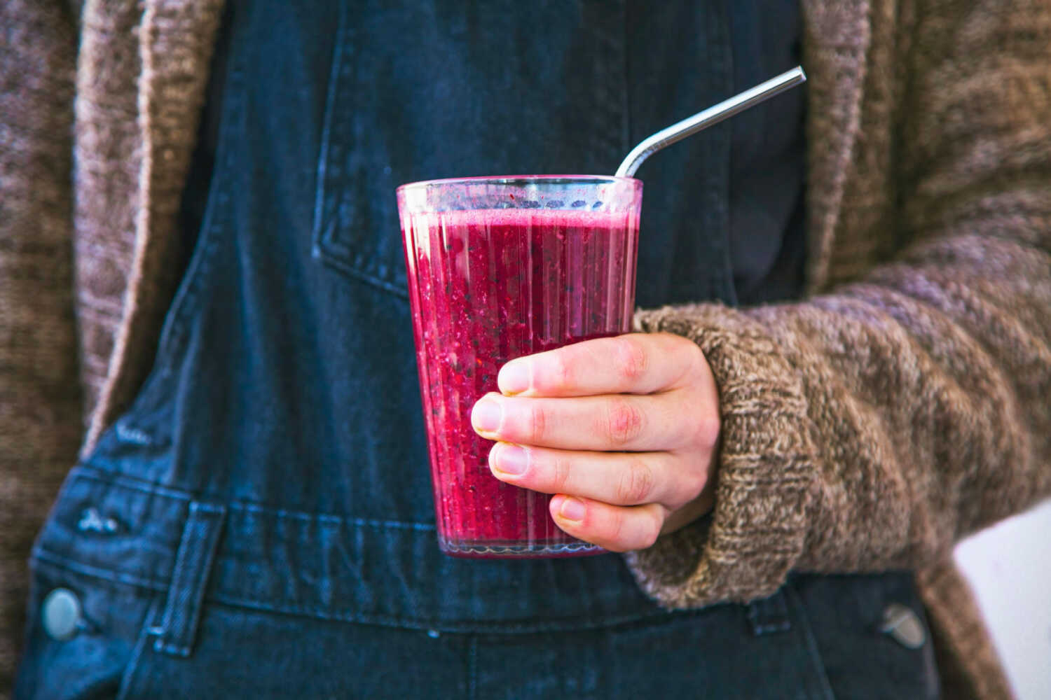 woman with elderberry smoothie