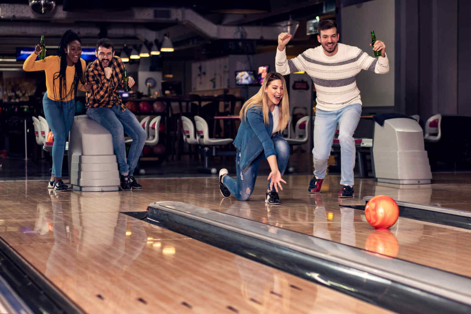 women taking precautions while bowling