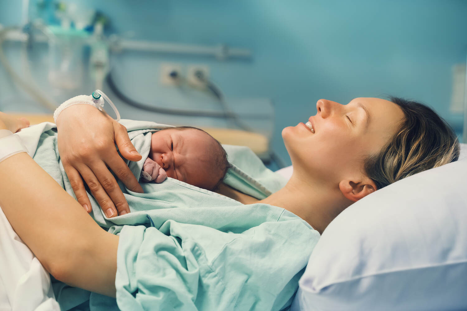 woman holding newborn