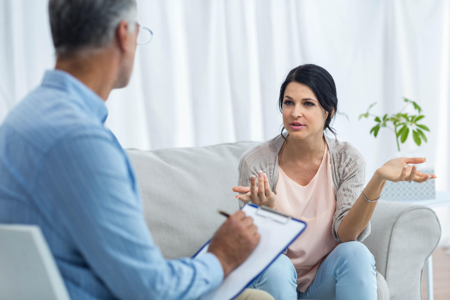 woman talking to doctor