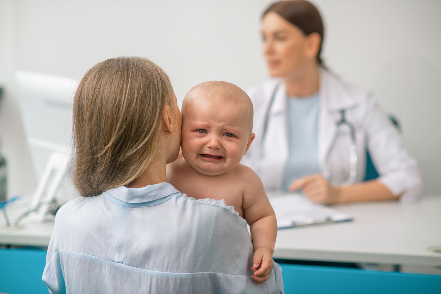 Consulting doctor for baby spitting mucus