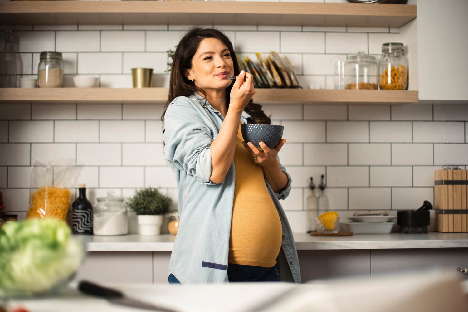 pregnant woman eating lamb