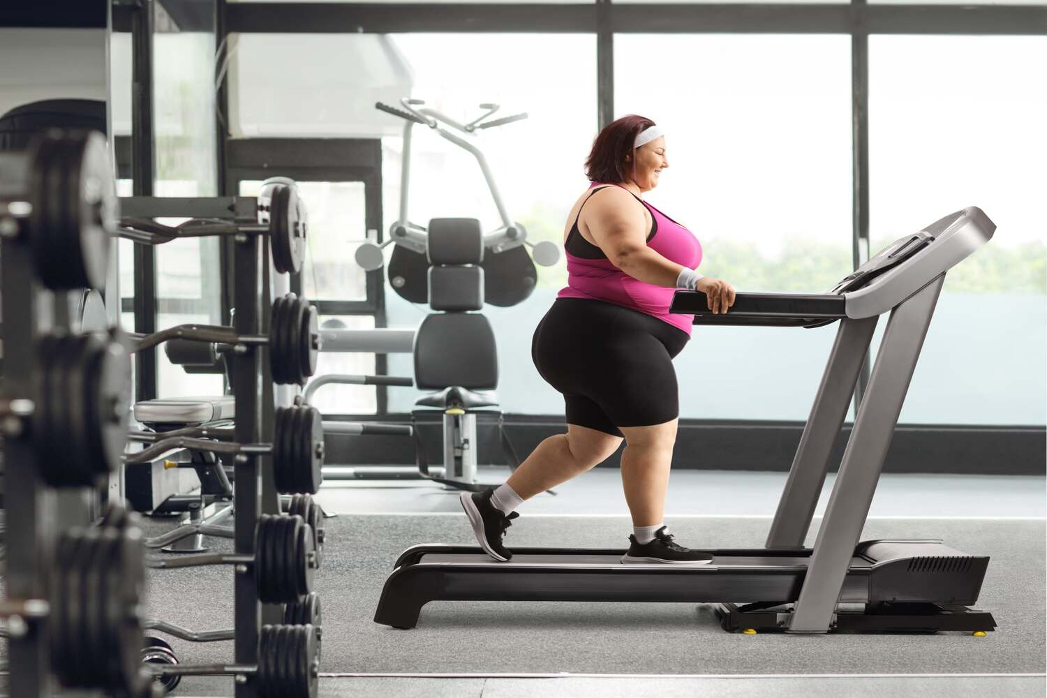 obese woman on treadmill