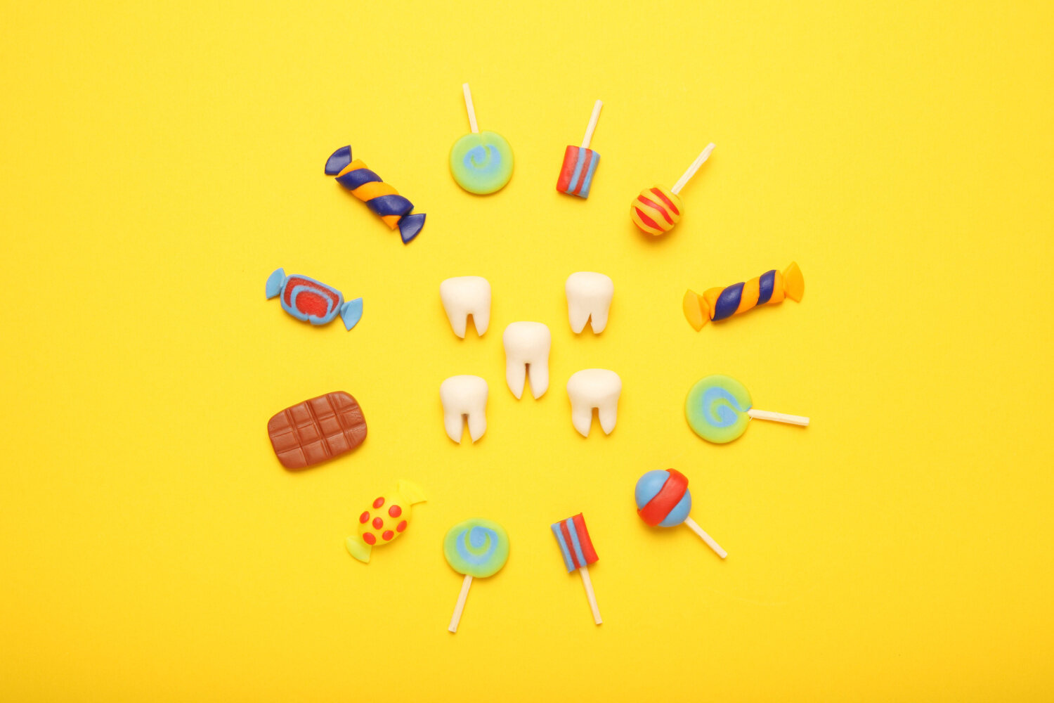 Eating sweets and poor dental hygiene can cause tooth decay