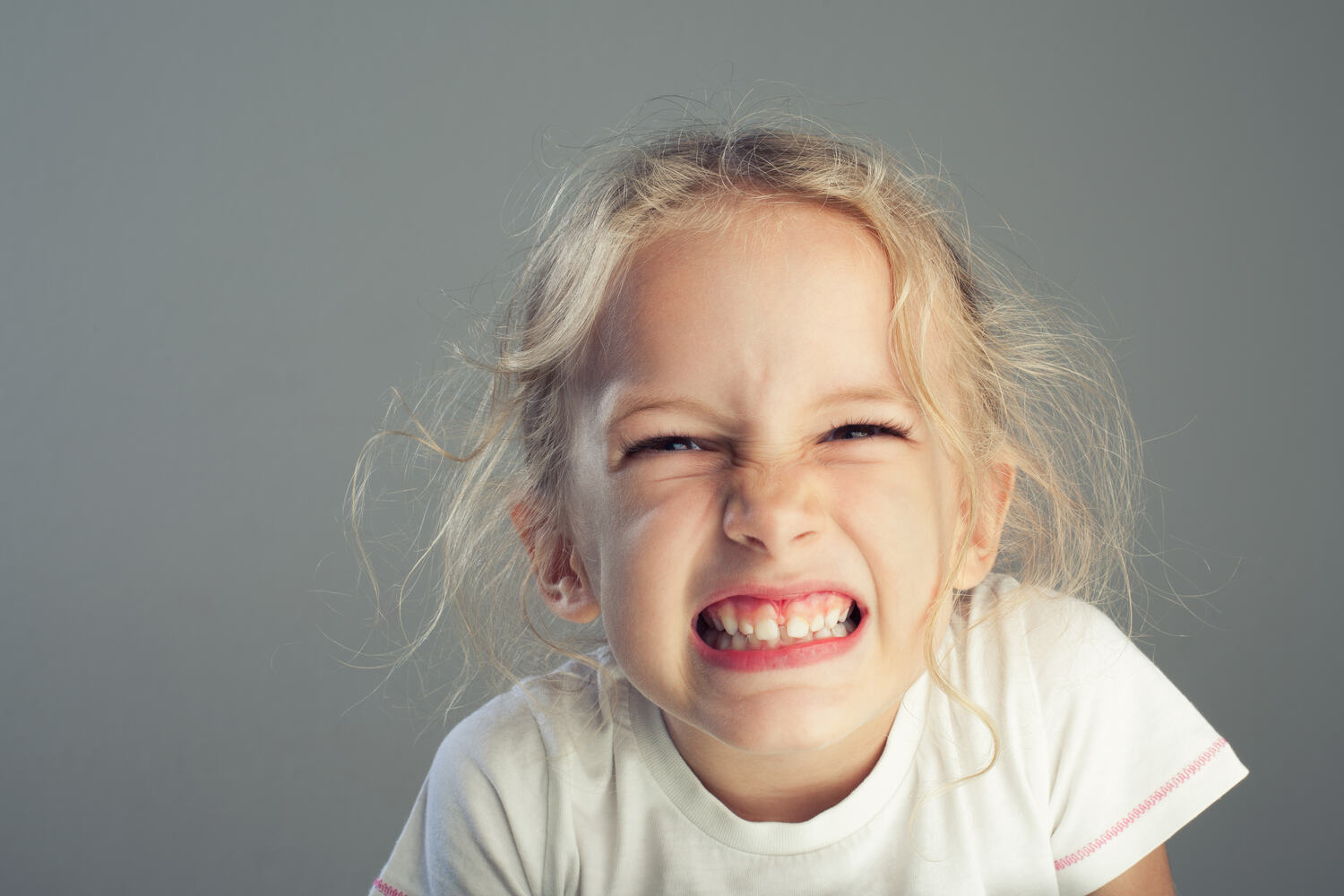 A toddler grinding teeth