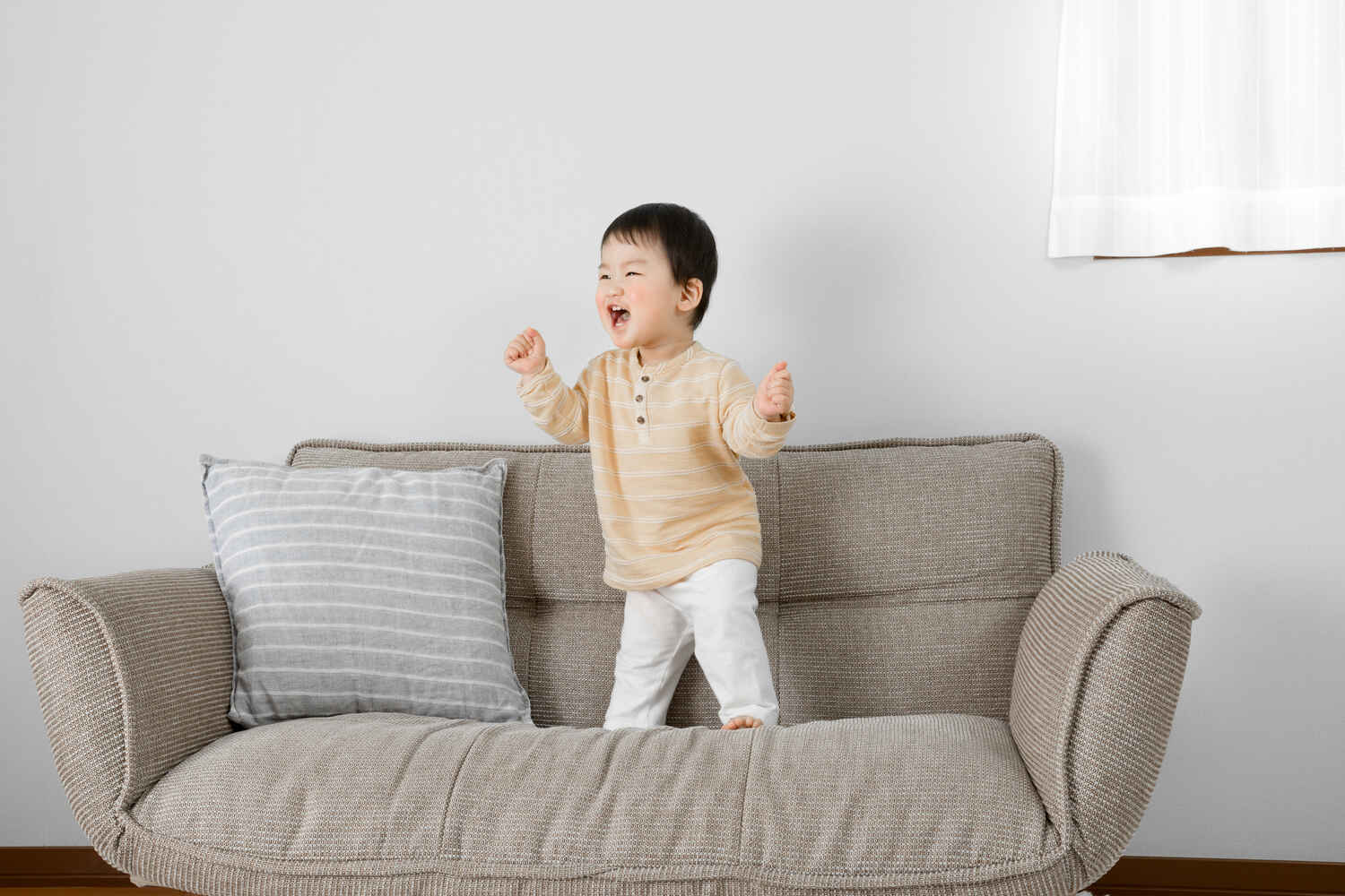 A toddler singing