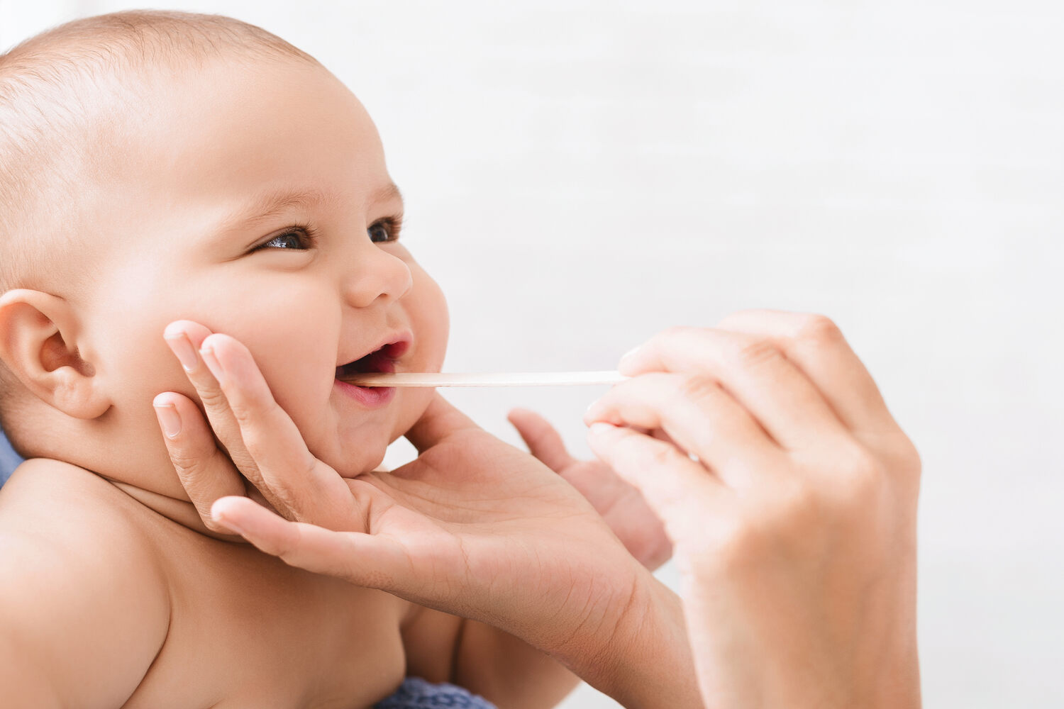 A baby getting dental check up