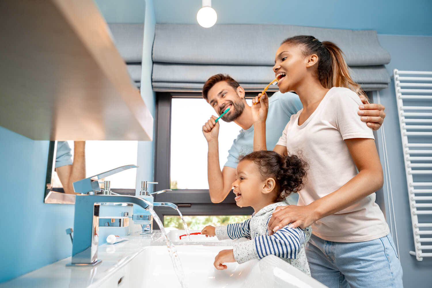 Show your toddler how to brush their teeth