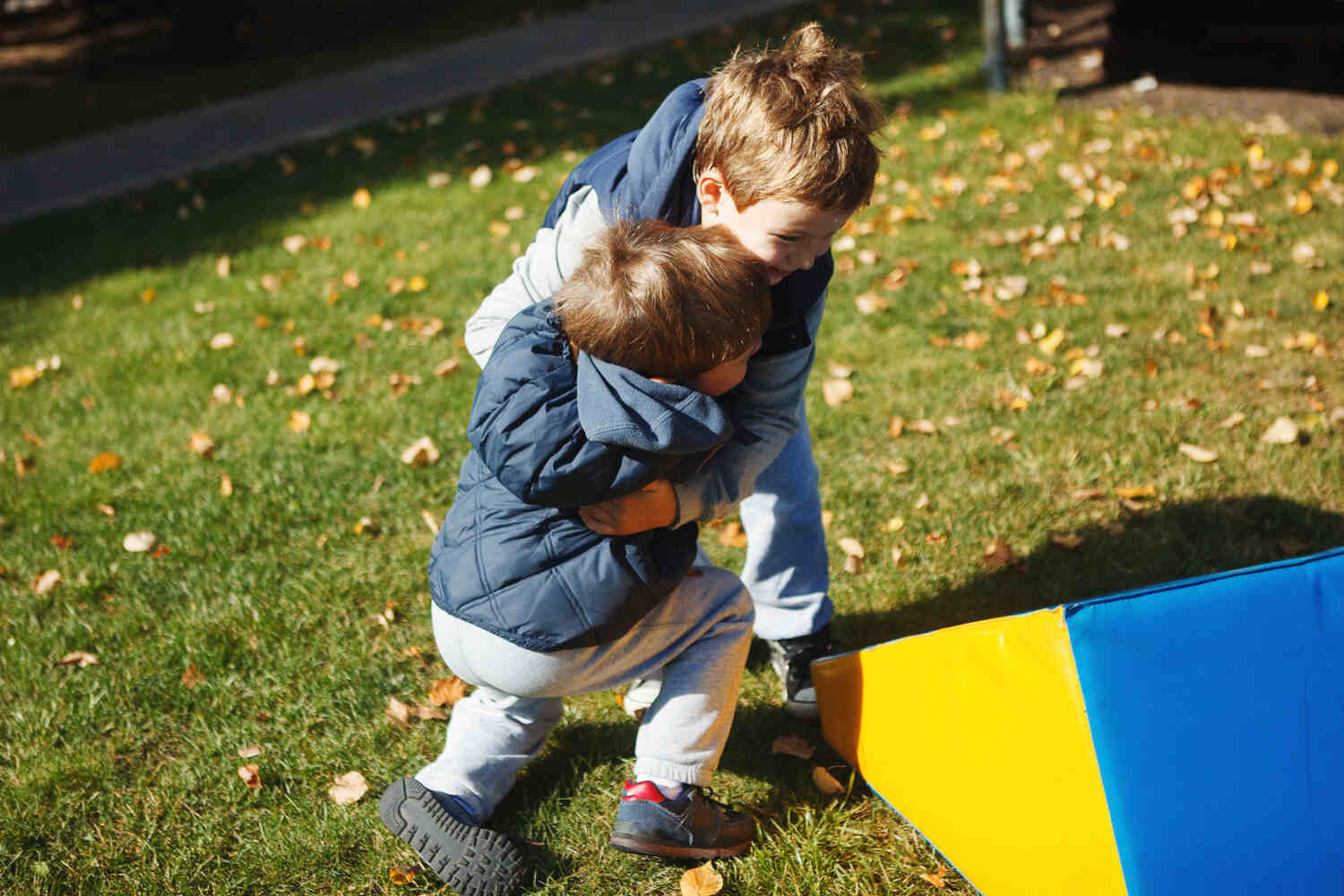 A toddler fighting with another boy