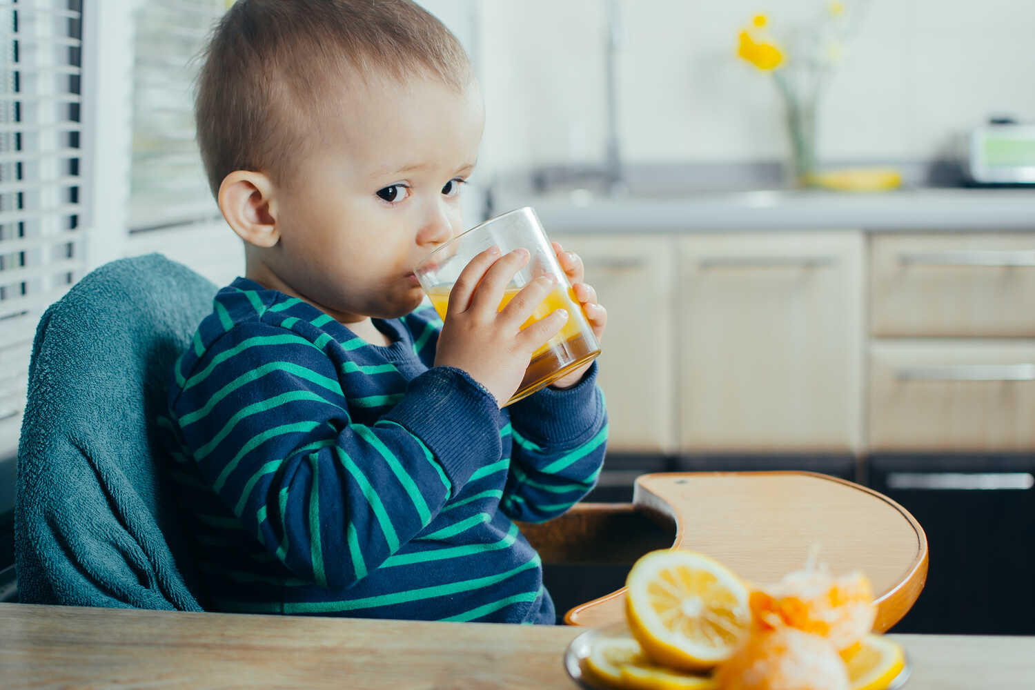 baby drinking juice