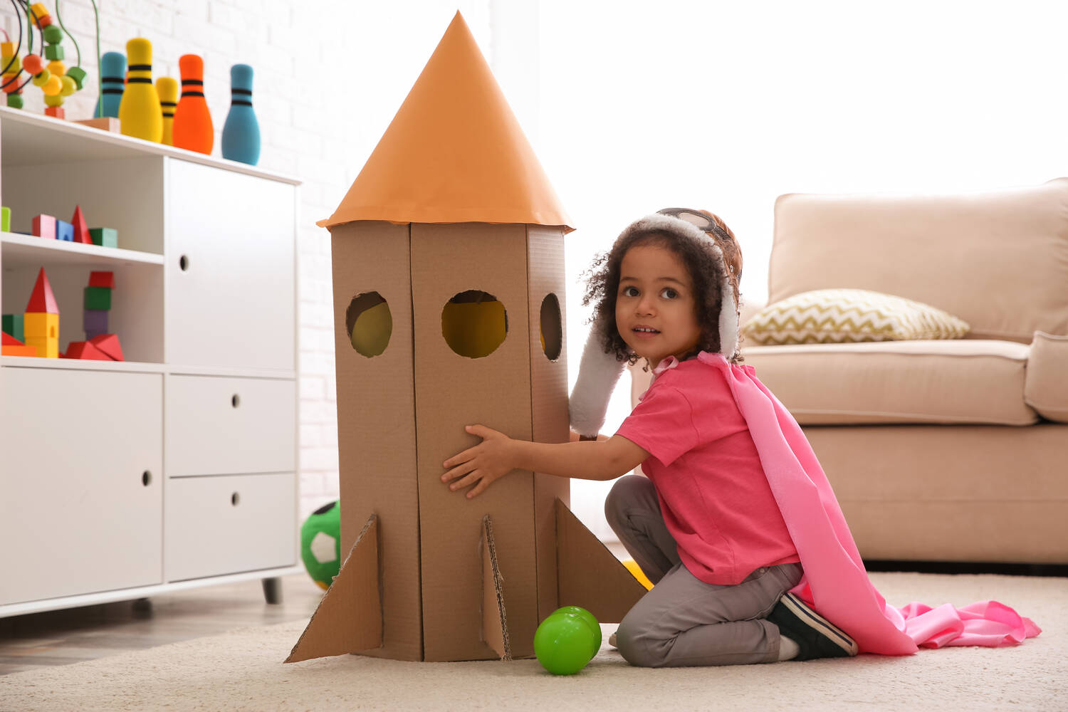 Props can trigger toddler's imagination into using them creatively
