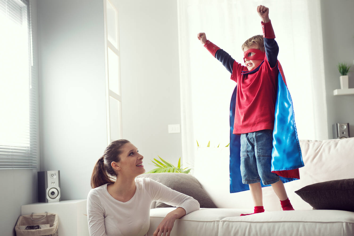 A kid dressed in superhero costume