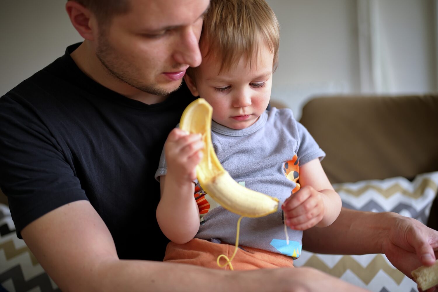 Let your toddler peel banana